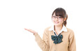 a young asian school girl showing on white background