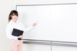 beautiful asian teacher in the classroom