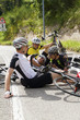 Group of men lying on the Ground After a Bike Accident