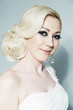 Studio portrait of beautiful blonde bride