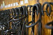 Horse bridles hanging in stable