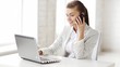 attractive office worker taking phone call