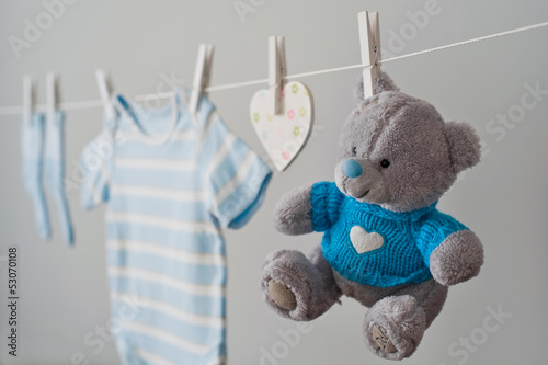 Photo: blue baby clothes on the clothesline blue baby clothes on the clothesline