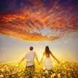 couple holding hands and walks away
