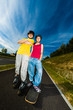 Photo: Active young people - rollerblading, skateboarding Active young people - rollerblading, skateboarding