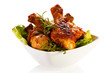 Photo: Grilled chicken legs and vegetables on white background Grilled chicken legs and vegetables on white background
