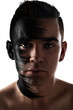 Handsome guy with artistic black shadow on his face