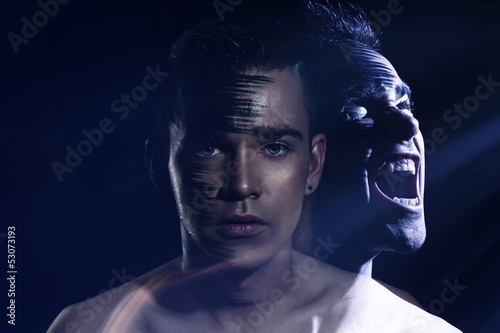 Photo: Handsome guy with agressive shadow Handsome guy with agressive shadow
