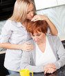 Daughter soothes sad mother