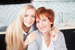 Woman with daughter on kitchen