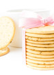 Cookies with  ribbon and tea cup isolated on white background, c