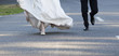 Bride and groom running