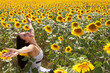 Photo: Cheerful in a sunflower field Cheerful in a sunflower field