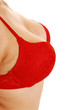 Breast in red bra.
