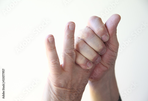 Photo: man with sore fingers man with sore fingers