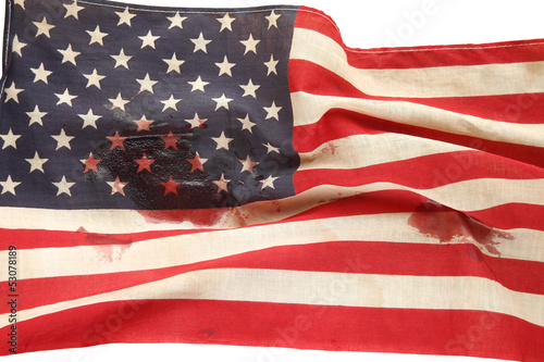 Photo: American flag with bloodstains American flag with bloodstains