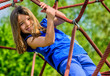 pretty girl doing rock climbing