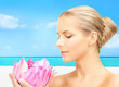 lovely woman with lotos flower