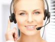 Photo: friendly female helpline operator friendly female helpline operator