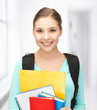 Photo: student with books and schoolbag student with books and schoolbag