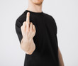 man showing middle finger
