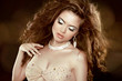Photo: Beautiful woman with long brown curly hair and makeup. Hairstyle Beautiful woman with long brown curly hair and makeup. Hairstyle