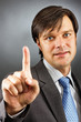 Businessman pressing an imaginary button