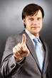 Businessman pressing an imaginary button