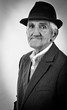 Portrait of an expressive old man with hat