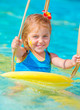 Cute little girl in water park