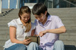 Two students using tablet