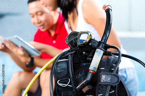 Photo: Dive master and student in Asian diving school Dive master and student in Asian diving school