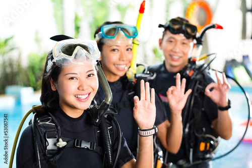 Photo: People in diving school, students and master People in diving school, students and master