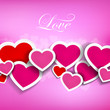 Vector illustration of hearts on a pink background