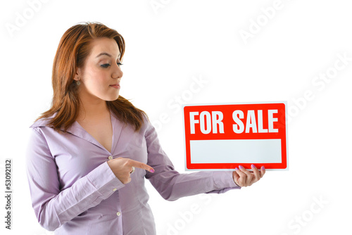 Photo: Sales Person Pointing at "For Sale" Sign Sales Person Pointing at "For Sale" Sign