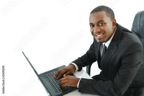 Photo: Business Man With Laptop Business Man With Laptop