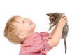Photo: boy with a kitten. isolated on white background boy with a kitten. isolated on white background