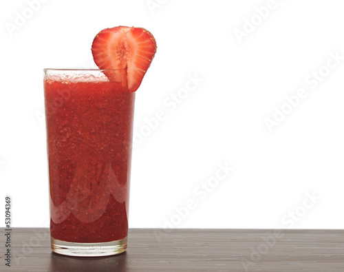Photo: glass of strawberry puree glass of strawberry puree