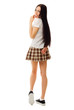 Modest girl in plaid skirt