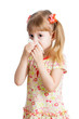 girl crying and  cleaning nose with tissue isolated on white