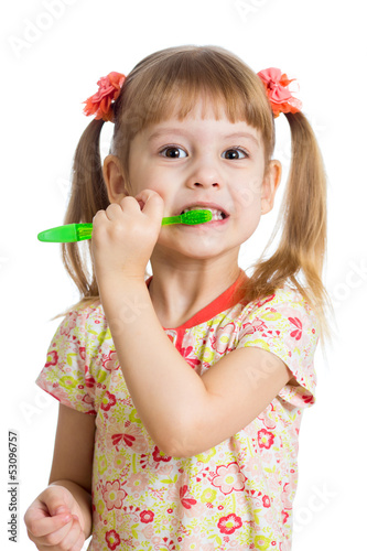 Photo: child girl brushing teeth isolated on white background child girl brushing teeth isolated on white background