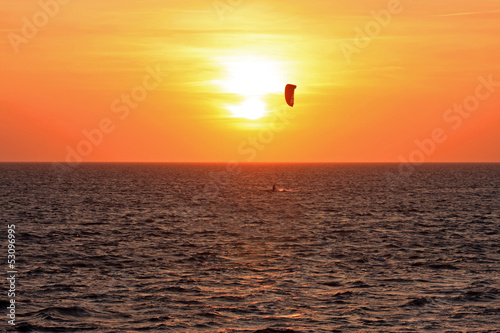 Photo: kitesurfer at sunset kitesurfer at sunset