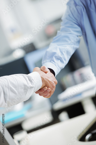 Photo: Businessmen shaking hands Businessmen shaking hands