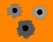three bullet holes in the wall