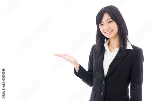 Photo: attractive asian businesswoman showing attractive asian businesswoman showing