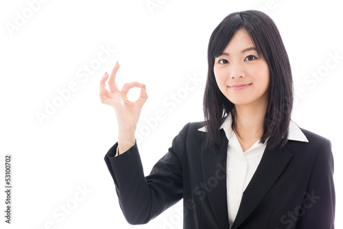 Photo: attractive asian businesswoman showing okay sign attractive asian businesswoman showing okay sign