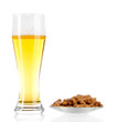 Beer in glass and croutons isolated on white