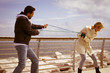 Conflict - young woman pulled by rope from boyfriend