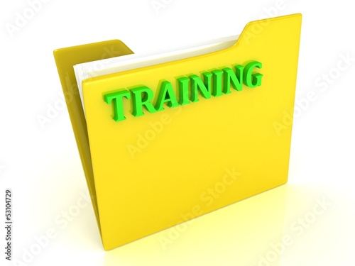 Illustration: TRAINING bright green letters on a yellow folder with papers TRAINING bright green letters on a yellow folder with papers