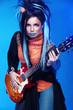 Rock girl posing with electric guitar playing hard-rock isolated
